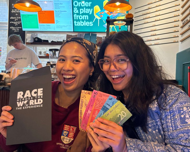 Team of two playing Race Across The World: The Experience in London