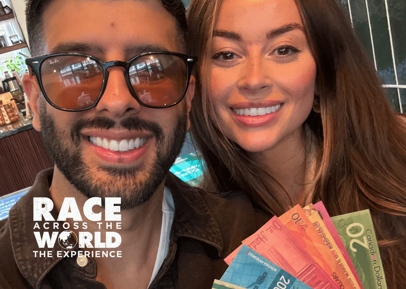 Couple playing Race Across The World: The Experience
