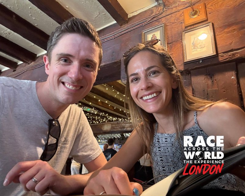 Team signing guest book on Race Across The World The Experience in London