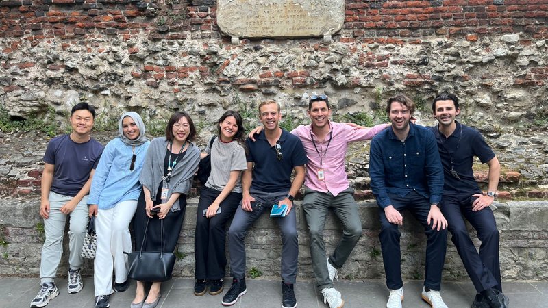 Team playing Race Across the World: The Experience posing for a photograph in London