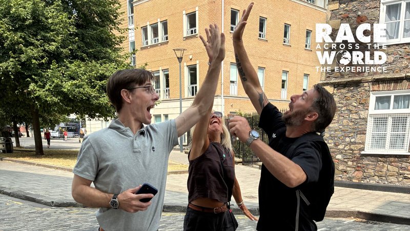 Team playing Race Across the World: The Experience posing for a photograph in Bristol