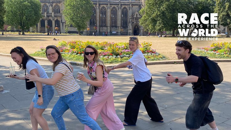 Team playing Race Across the World: The Experience posing for a photograph in Bristol