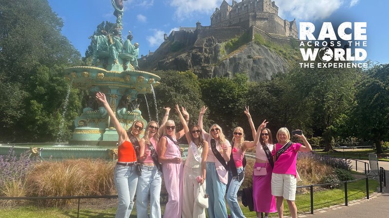 Team playing Race Across the World: The Experience posing for a photograph in Edinburgh
