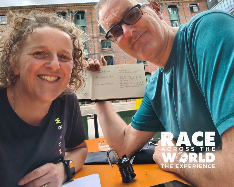 raceacrosstheworldexperience-couple-signing-guestbook