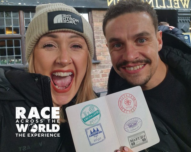 raecacrosstheworldcouple-holding-passport